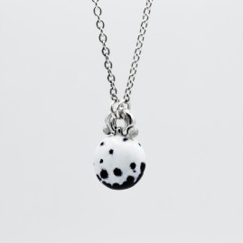 Handmade silver and copper hot enamel necklace with Dalmatian motif .